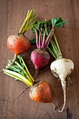 Four different coloured turnips
