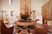 Wooden chairs and coffee table in Spanish style home