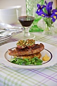 Lamb chops on a bed of bubble and squeak (England)