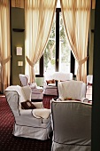 White wing chairs in living room