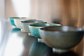 Row of bowls on countertop