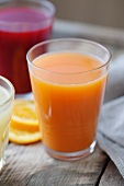 Carrot and orange juice in a glass
