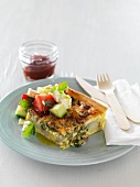 Courgette pie with bacon and a Greek salad