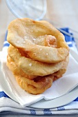 A stack of fried pizza dough