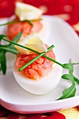 Boiled egg filled with smoked salmon and lemon