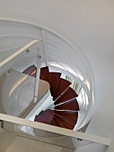 View from top down modern spiral staircase