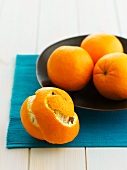 Oranges, whole and peeled