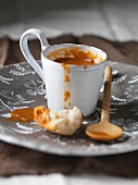 Close up of mug of tomato soup