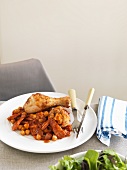 Chicken leg with chorizo and chickpeas