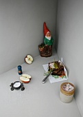 An image representing German cuisine, with pumpernickel bread and a garden gnome