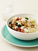 Couscous Topped with Chickpeas, Zucchini and Feta Cheese