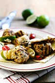 Grilled turkey kebabs with limes and unleavened bread