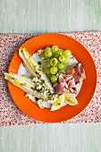 Chicory with pepper ham, blue cheese and grapes