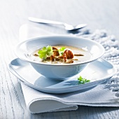 Chanterelle mushroom soup with leek and coriander