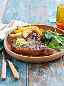 Plate of steak with potatoes and salad