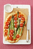 Green asparagus and cherry tomato pizza