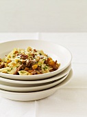 Bowtie Pasta with Ground Sausage in Stacked Bowls