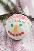 Cupcake mit Schneemann-Gesicht