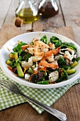 Warm seafood salad with courgettes, lambs lettuce, prawns, squid and octopus
