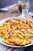 Penne pasta omelette with ham and cheese