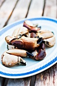 Raw crab claws on a plate