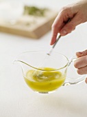 Hand Whisking Dressing in a Small Pitcher