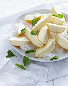 Bowl of lemoncello wedges on ice
