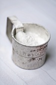 Powdered Sugar in a Metal Sifter
