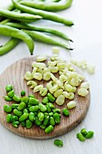 Broad beans with pods and empty skins