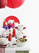 Table set with Chinese food and soda
