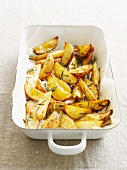 Dish of roasted potatoes with herbs