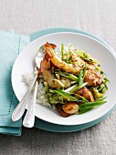 Plate of prawns with rice and onions