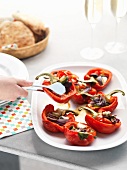Stuffed peppers filled with feta cheese, tomatoes and basil