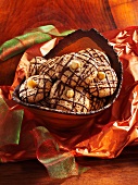 Hazelnut macaroons decorated with chocolate
