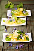 Potato salad with borrage flowers