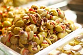 Tuna Stuffed Olives on Toothpicks at a Market