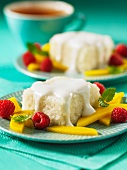 Rice pudding with mango and raspberries