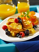 French toast with fresh berries and slivered almonds