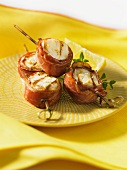 Grilled scallops wrapped in bacon