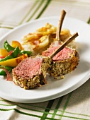Lamb chops with potato gratin and vegetables
