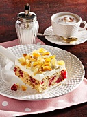 Cranberry cake with mascarpone cream and slivered almonds