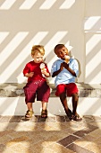 Young boys eating ice cream