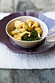 Fried cauliflower with a herb sauce