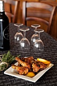 Chicken pieces baked in wine with caramelised lemons
