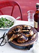 Grilled chicken on a wooden board