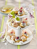 Decorated profiteroles on a cake stand