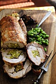 Roast pork loin with broad bean and cheese stuffing
