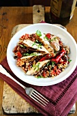 Spicy griddled chicken breast with sweet pepper and tomato bulgur wheat salad