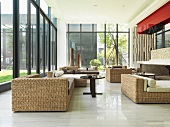 Wicker furniture in large modern sunroom