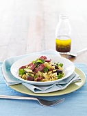 Pasta salad with salami and olives